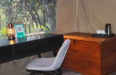A guest tent with its own lounge area
